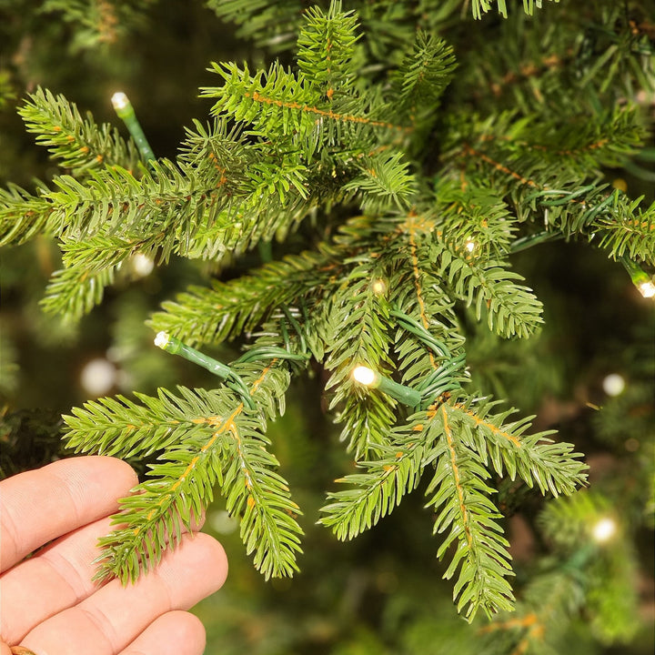 ÁRVORE REALISTA PINHEIRO AUSTRAL 2,10CM 450 LEDS WARM 801 GALHOS BIVOLT