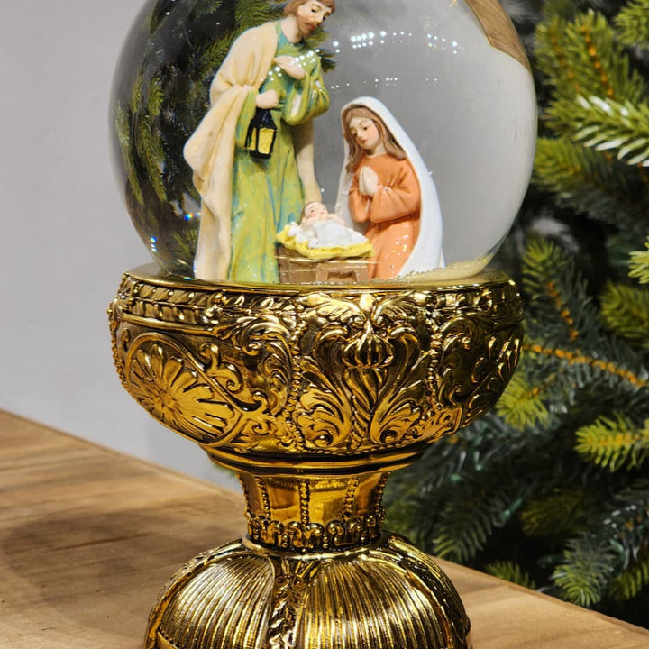 GLOBO DE NEVE COM SAGRADA FAMÍLIA DOURADO LUZ E MOVIMENTO 26,5CM